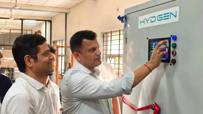 Capt Brijesh Chowta, Member of Parliament of Dakshina Kannada, unveils the first electrolyser unit manufactured at the HYDGEN facility in Mangaluru on Sunday, in the presence of Manipaddy Krishna Kumar (left), COO and Co-Founder of HYDGEN.
